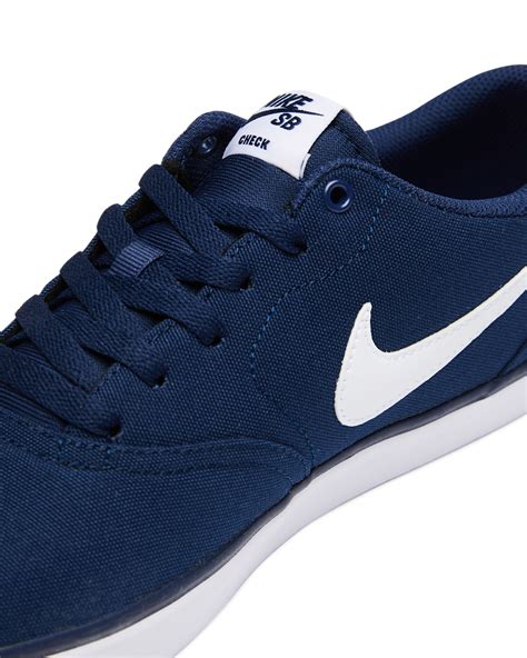 navy blue nike sneakers women's